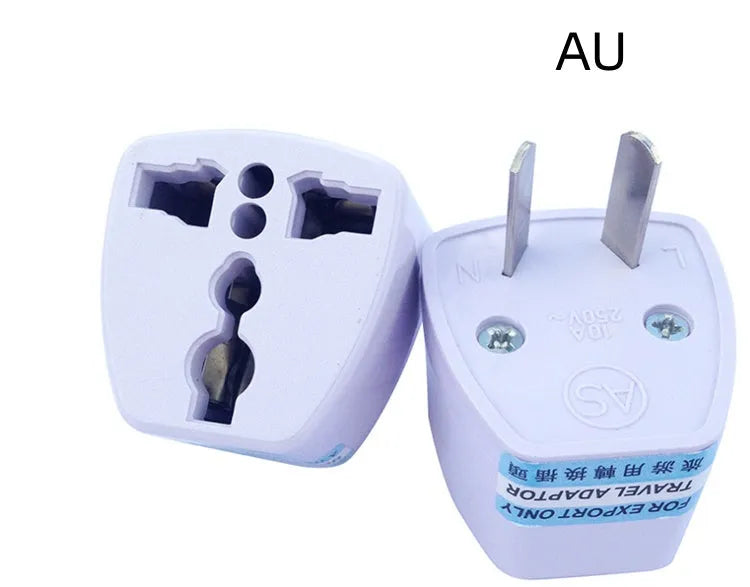 White and green multi-function electric cooking pot with temperature control dial, shown with a UK plug converter.