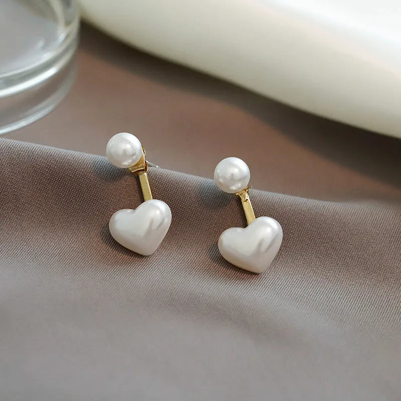 Heart-shaped pearl stud earrings with Korean design, alloy metal and artificial gemstone details