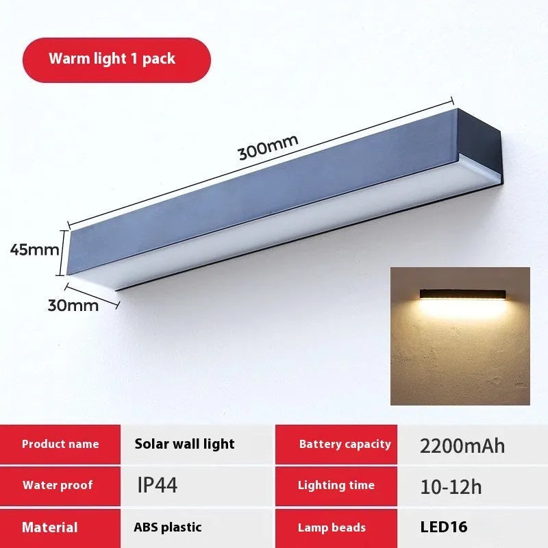 Black ABS plastic solar-powered outdoor wall strip light with IP65 rating.