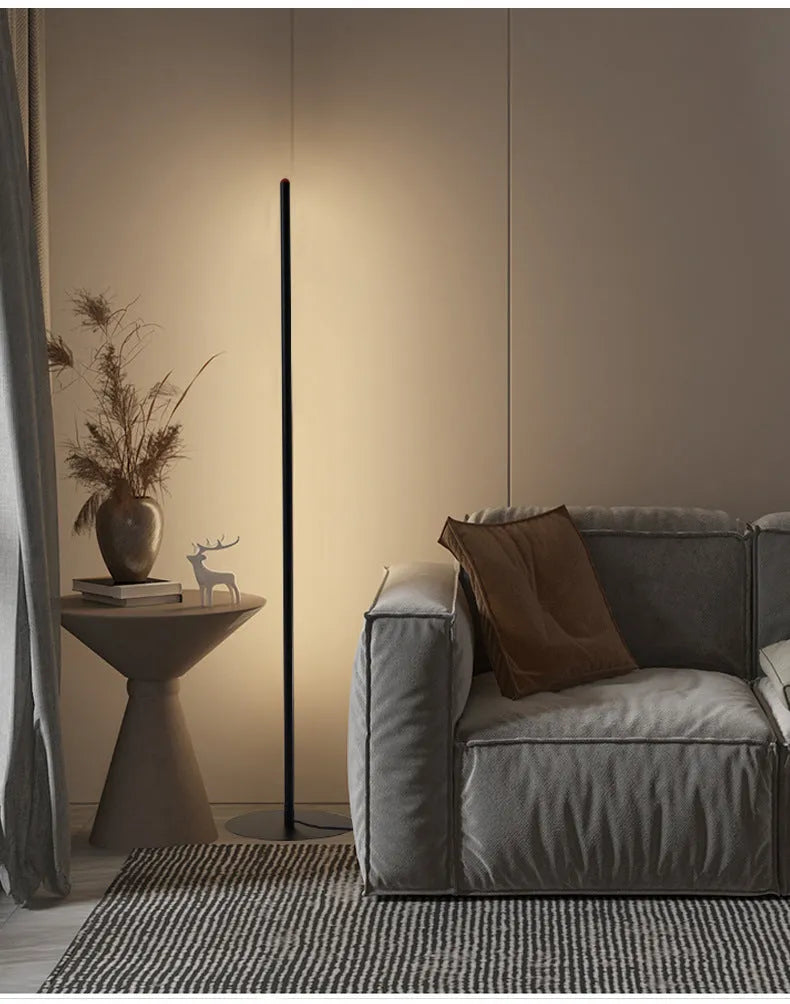 Tall, slim aluminium alloy vertical floor lamp with a simple design and LED light.