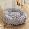 Circular plush pet bed mat in beige colour showing soft long hair rabbit plush material texture