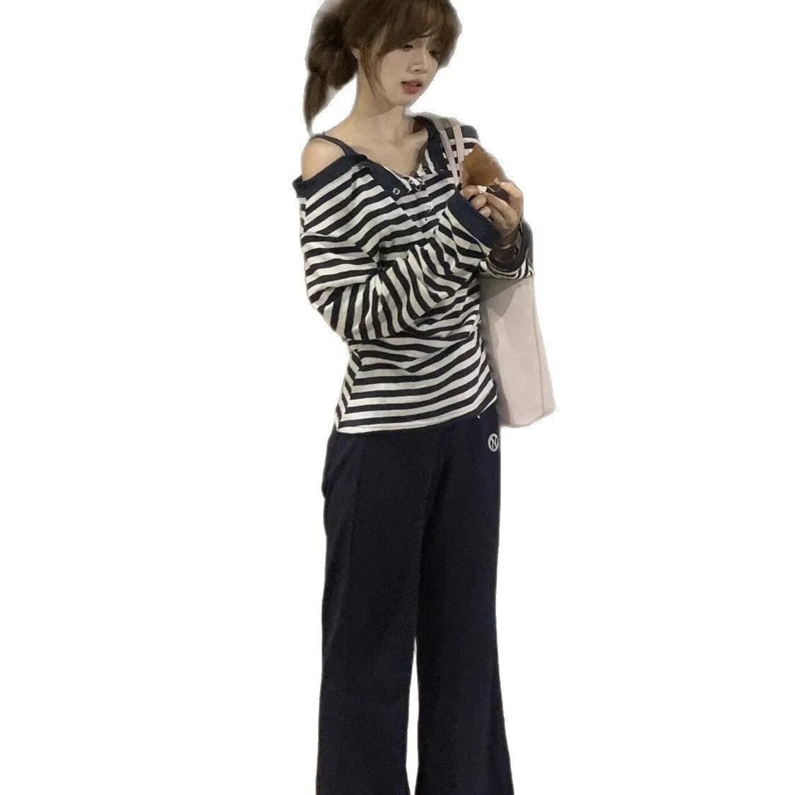 Dark blue women's oversized long-sleeve t-shirt with Korean style, embroidery, and stripe details.