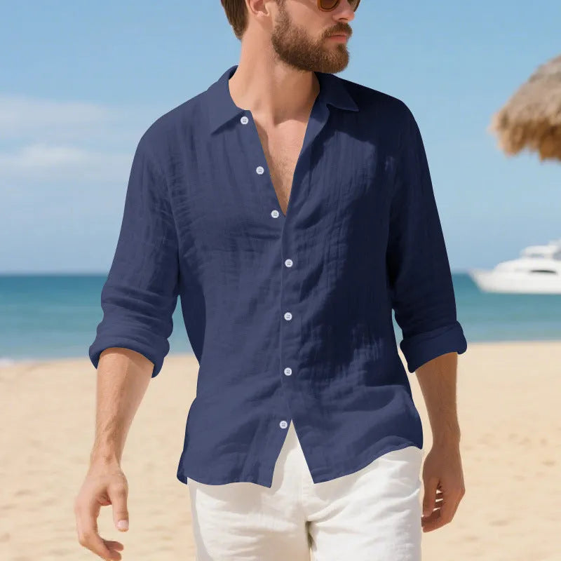 Man wearing a loose-fit light blue linen casual shirt with short sleeves
