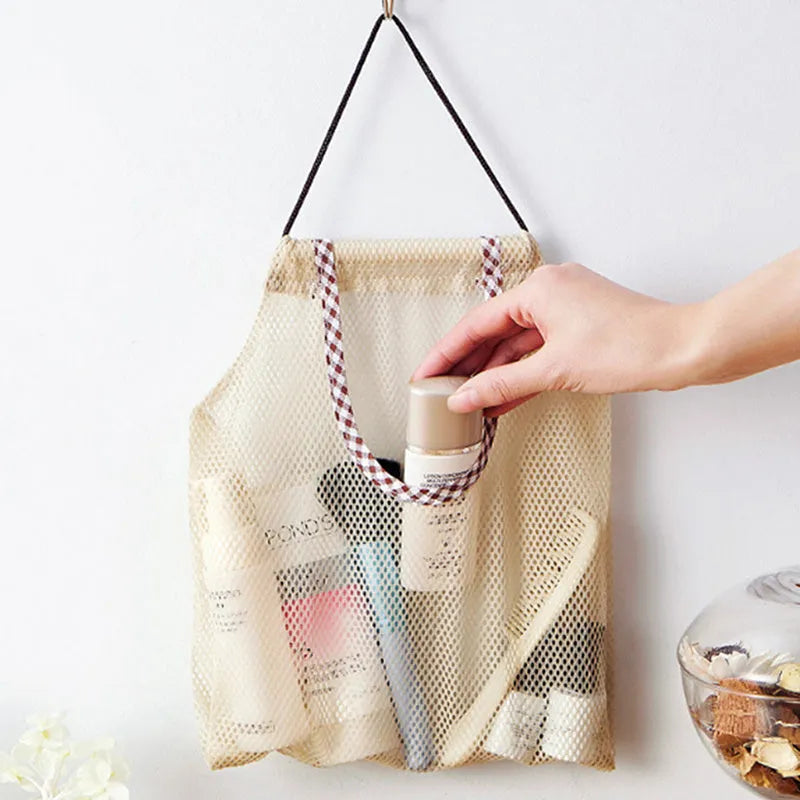 Beige plaid polyester mesh storage bag with cotton rope handles measuring 26x29cm