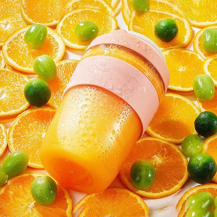 Portable 400ml blender juicer cup with four stainless steel blades in purple, green, or orange colours