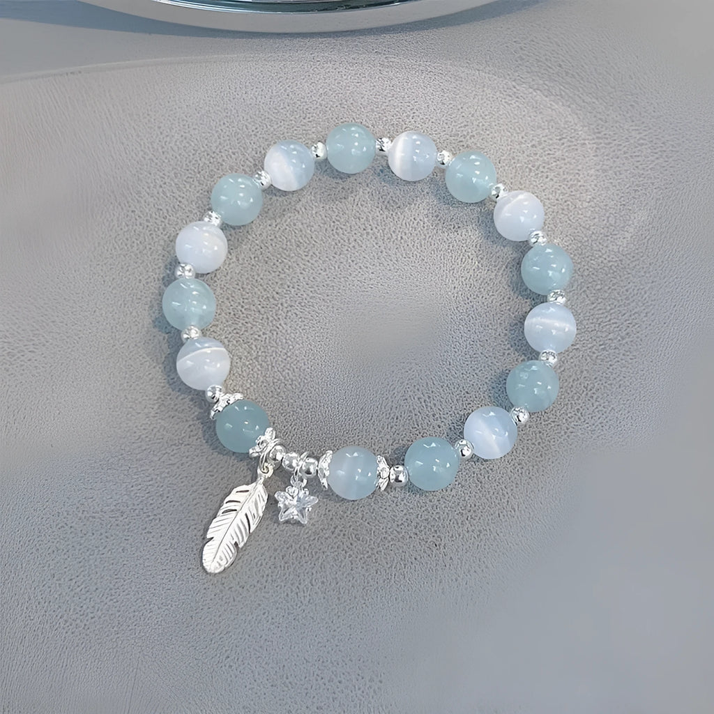Korean style glass crystal bracelet with feather XingX blue moonlight colour and eight Awn star design