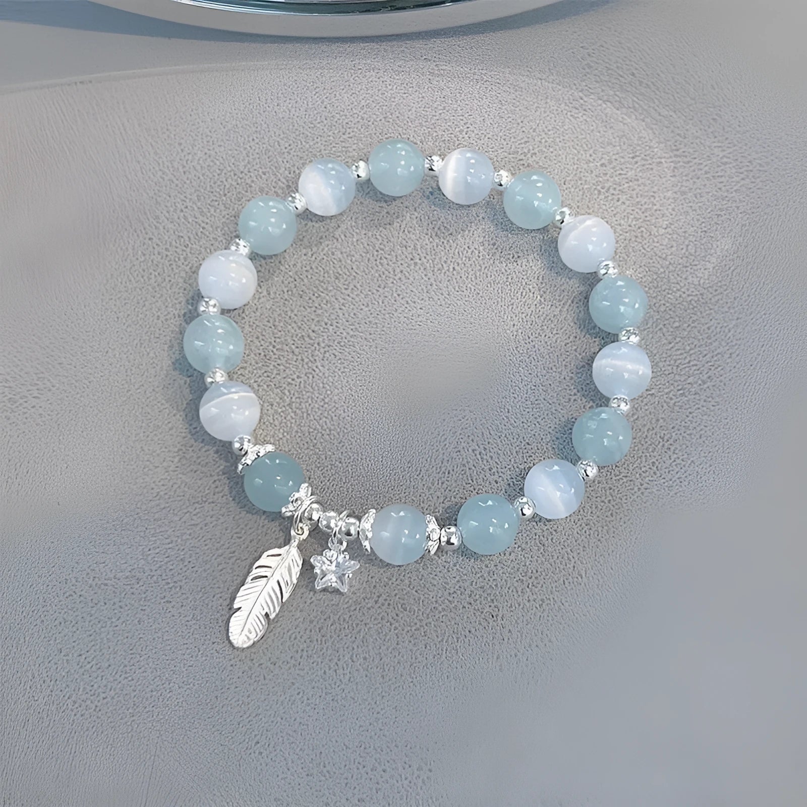 Korean style glass crystal bracelet with feather XingX blue moonlight colour and eight Awn star design