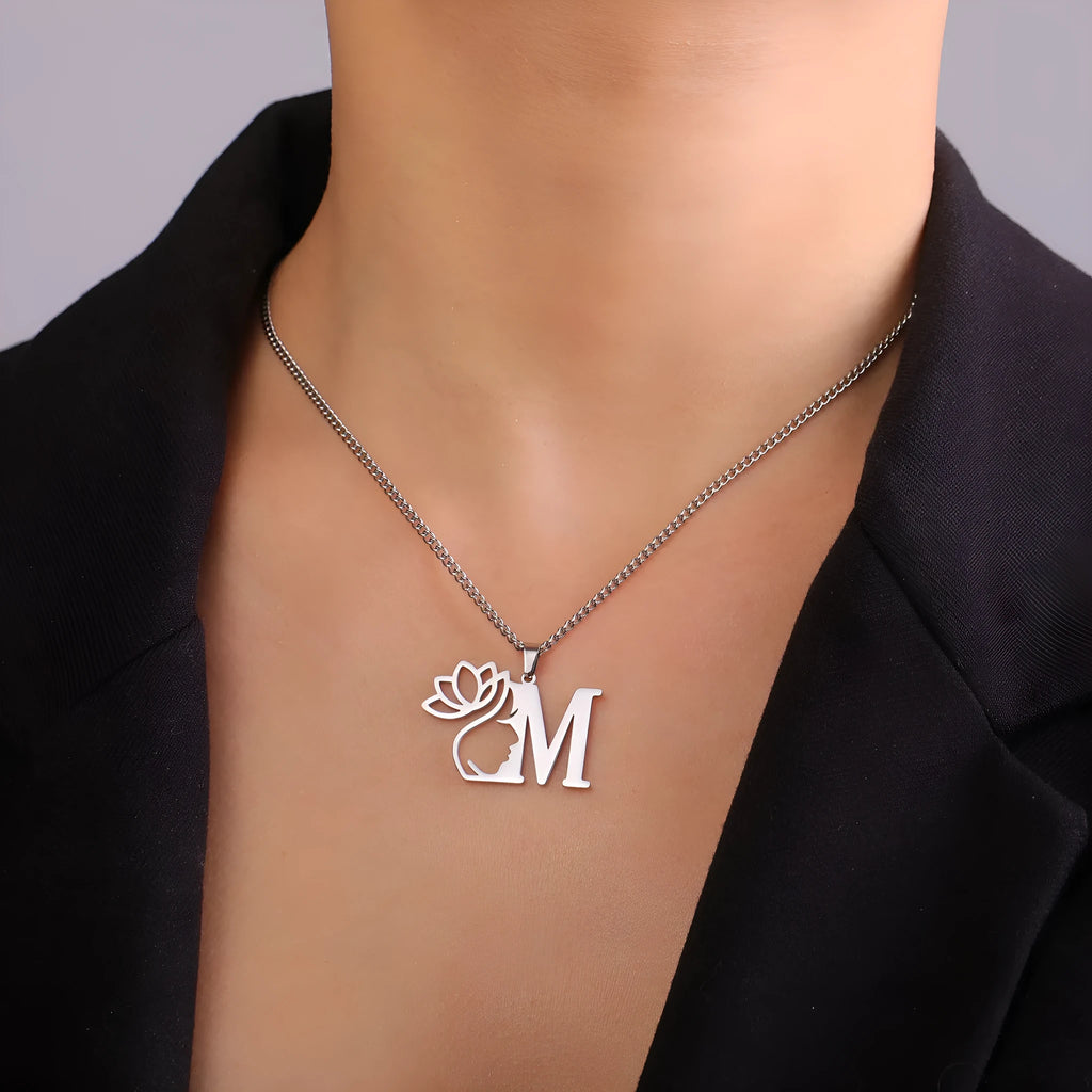 Stainless steel necklace with cross chain design and a pendant, shown in gold and silver colour options.
