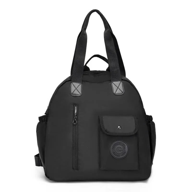 Large lightweight nylon backpack in khaki colour with a front sandwich pocket.