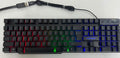 FV-Q1 wired luminous keyboard with six-colour backlight on a desk, connected to a computer