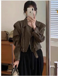 Women's slim-fit retro imitation leather jacket in black or brown with long sleeves and pockets
