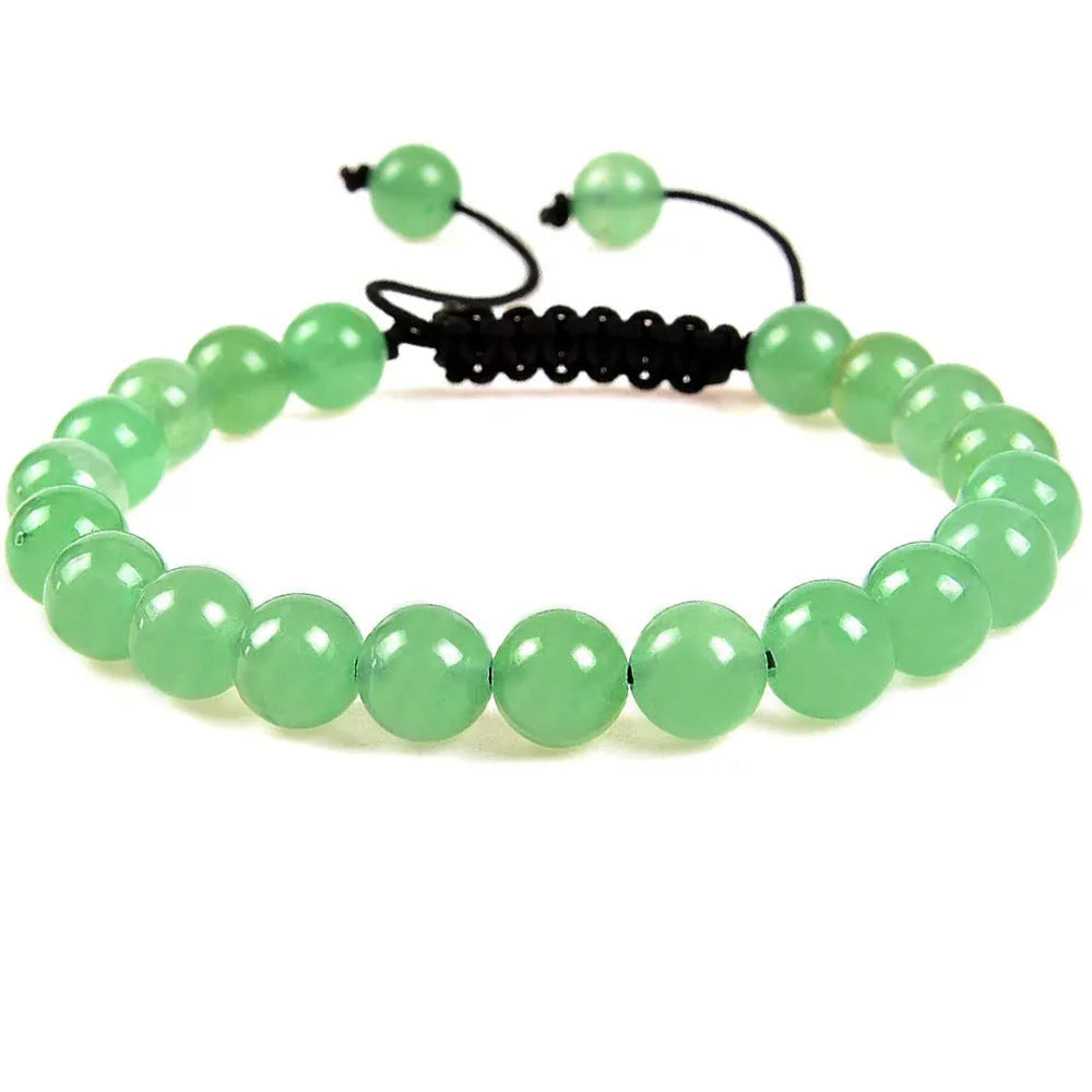 Women's aquamarine flat knot braided healing bracelet with hand-woven geometric texture
