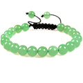 Women's aquamarine flat knot braided healing bracelet with hand-woven geometric texture