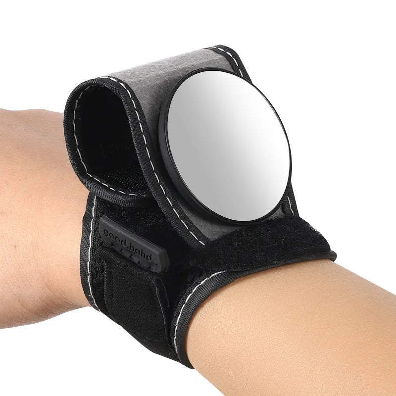 Black nylon bicycle wrist rear-view mirror with adjustable arm extended for cycling visibility