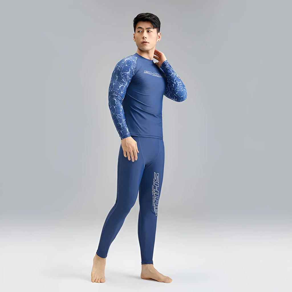Men's dark blue nylon swimwear set with pattern detail showing swim top and trunks