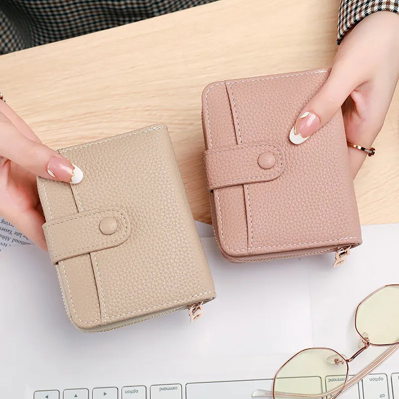 Lychee pattern pu leather ladies short wallet in two-fold design showing beige colour option.