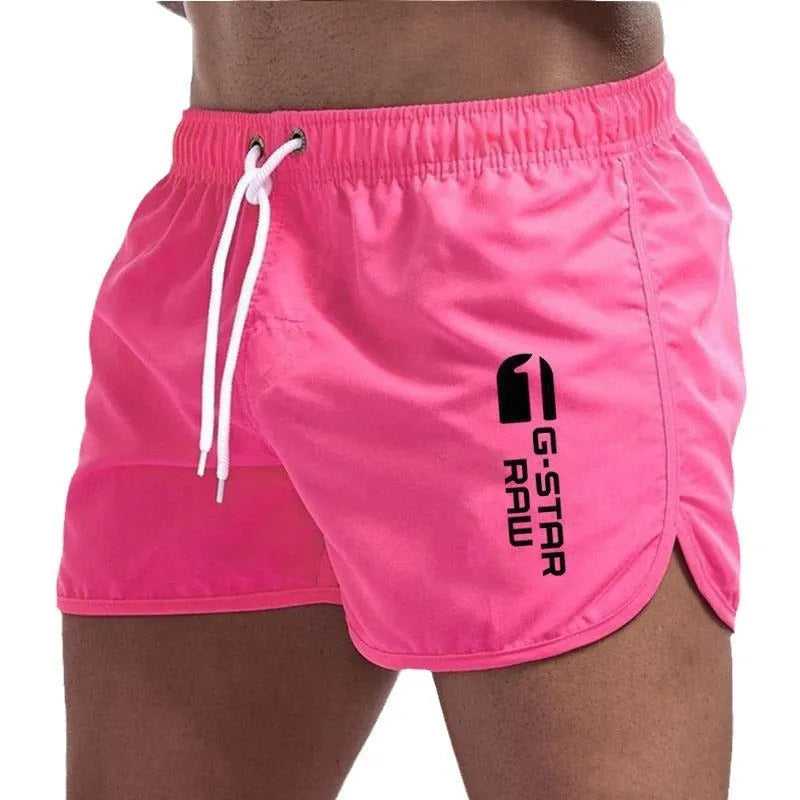 Men's thin hemp-blended polyester sport shorts in multiple colours on a mannequin, showing elastic waistband.