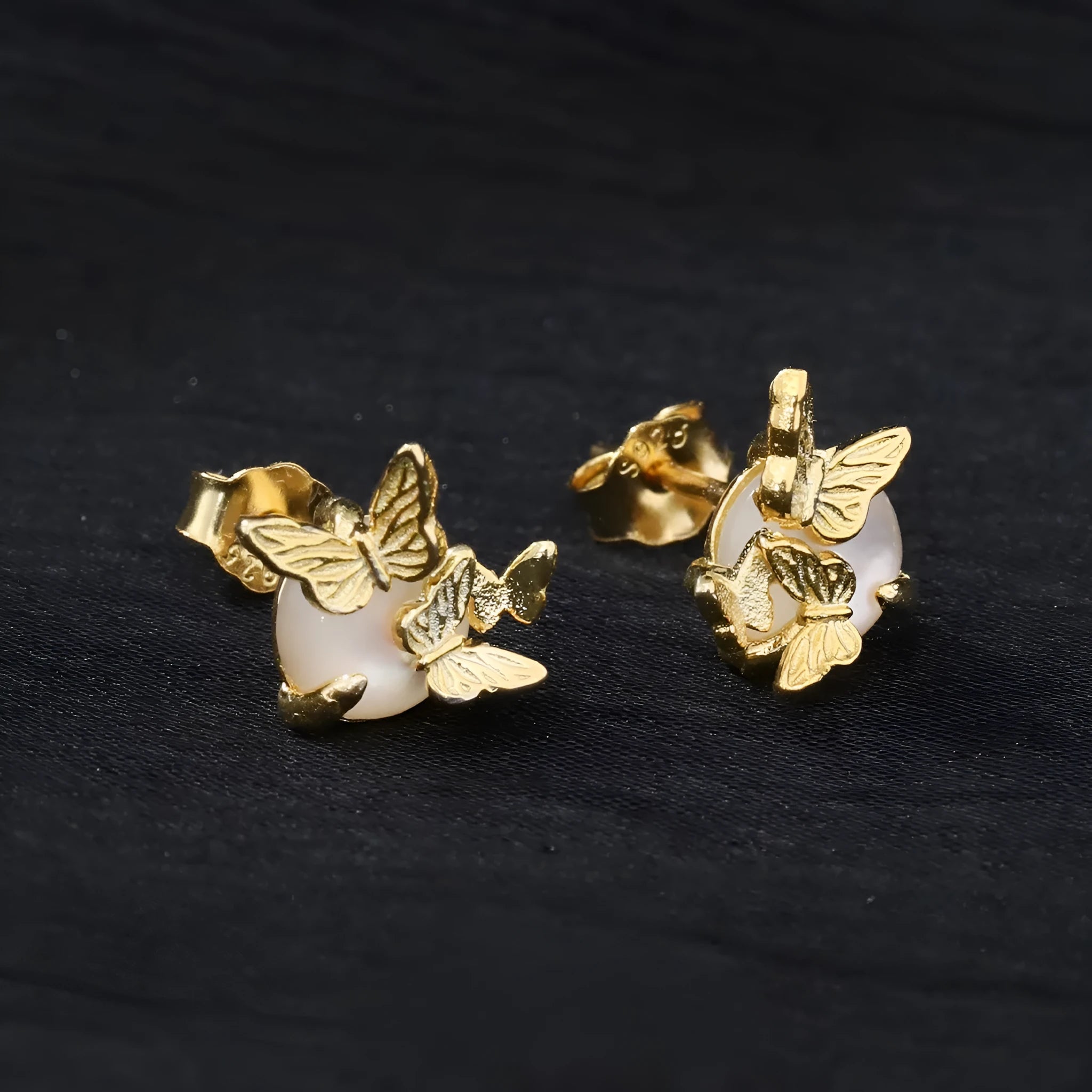 Butterfly motif sterling silver ear studs with electroplated gold or white gold colour finishes