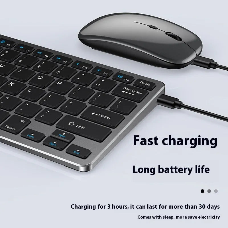 Ultra-thin black wireless keyboard and mouse combo with receiver and cover on a desk.