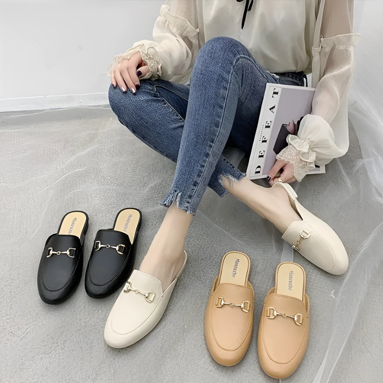 Women's closed toe PVC half slipper in milky white with a double buckle fastening.