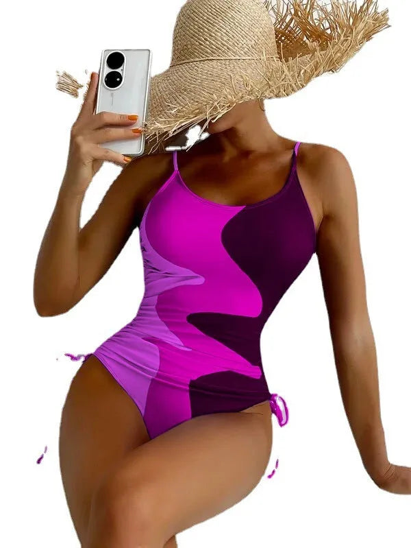 Blue women's sleeveless one-piece swimsuit with fixed swimming trunks on a mannequin