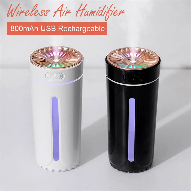 Black portable USB rechargeable humidifier with colourful LED lights on a car cup holder