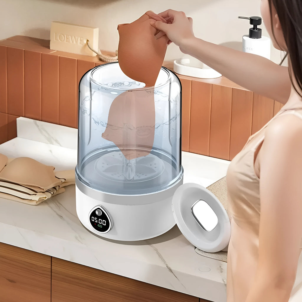 Compact white portable USB mini washing machine on a countertop.