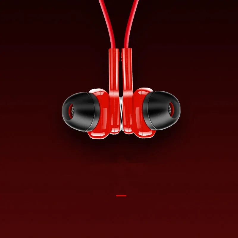 Red neckband sports Bluetooth earphones with earbuds and USB cable on a black background.