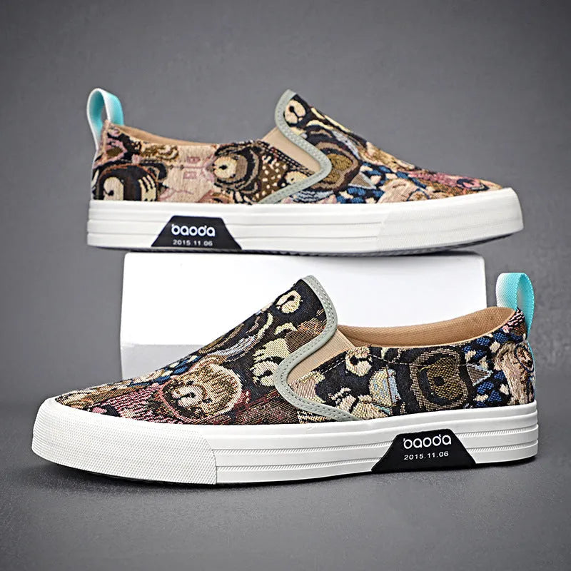 Khaki canvas slip-on sneakers with vulcanised rubber sole and mesh lining on a white background.