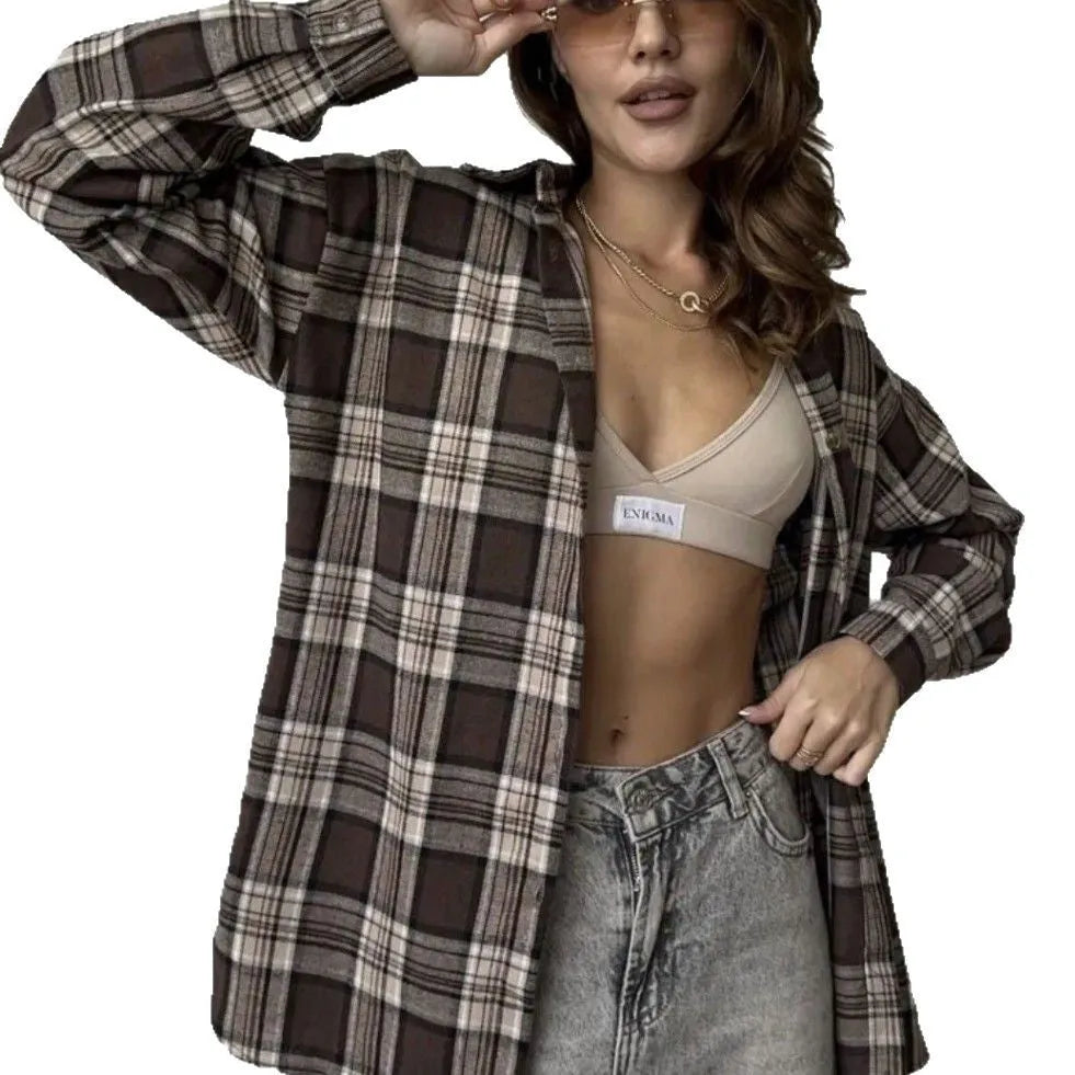 Dark brown retro striped long sleeve women's shirt on a hanger.
