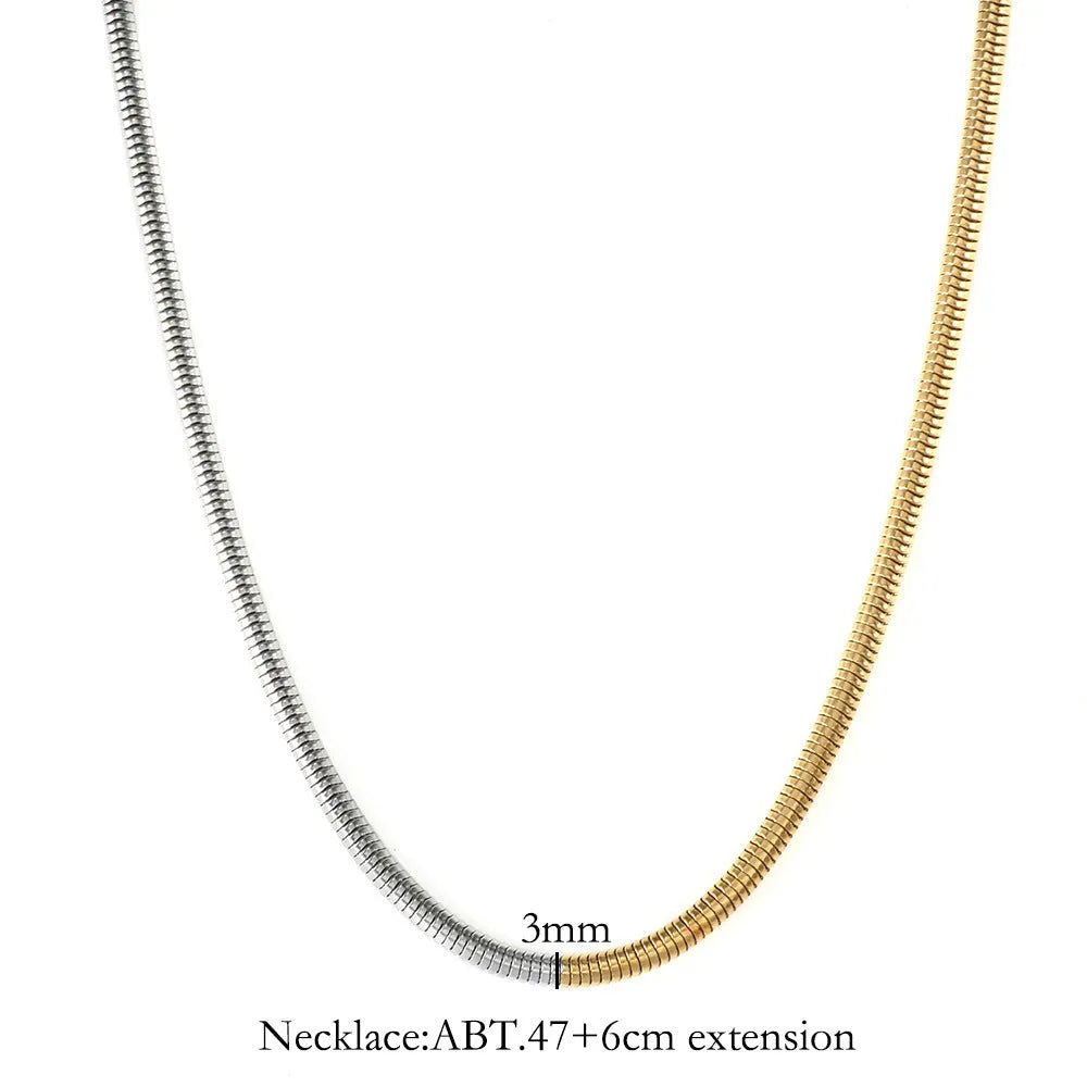 Golden 3mm thick stainless steel snake bone chain necklace for women.