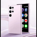 Black, green, and pink purple coloured mini Android smartphone with straight plate design on a white background.