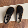 Beige linen slip-on shoes with a round toe and breathable mesh lining on a soft rubber sole.