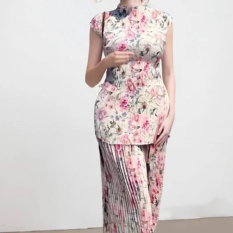 Women's printed chiffon dress set with high waist skirt and long sleeve top.