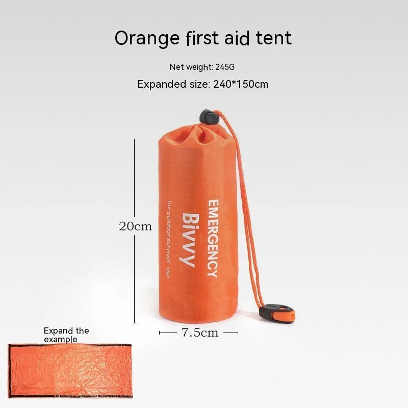 Orange and green emergency tent, sleeping bag, and raincoat kit for outdoor survival.