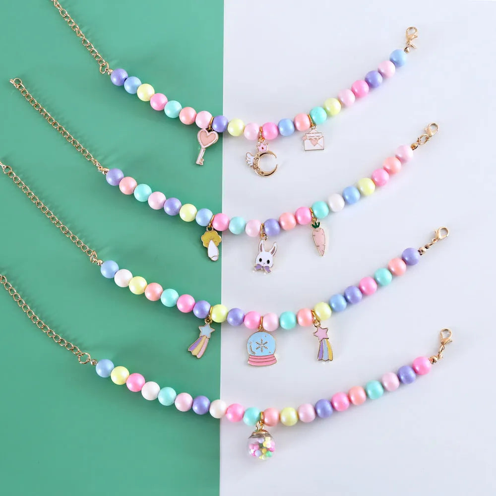 Colourful macaron-themed resin pet collar and matching bracelet set for cats and dogs.