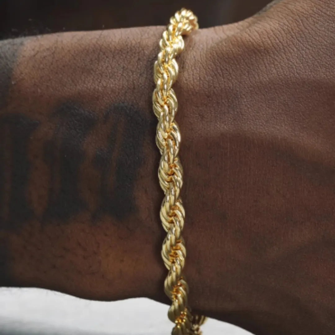 18K gold twist bracelet on a neutral background showing metallic finish and twist texture, three lengths available