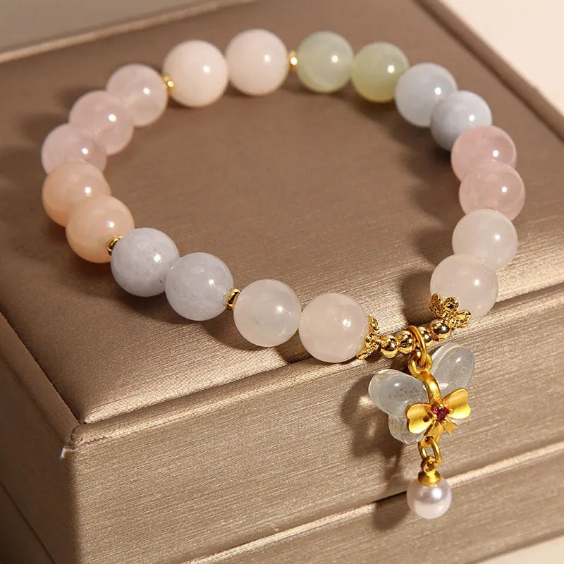 Women's morganite crystal bracelet with colourful butterfly pendant in original jewellery design