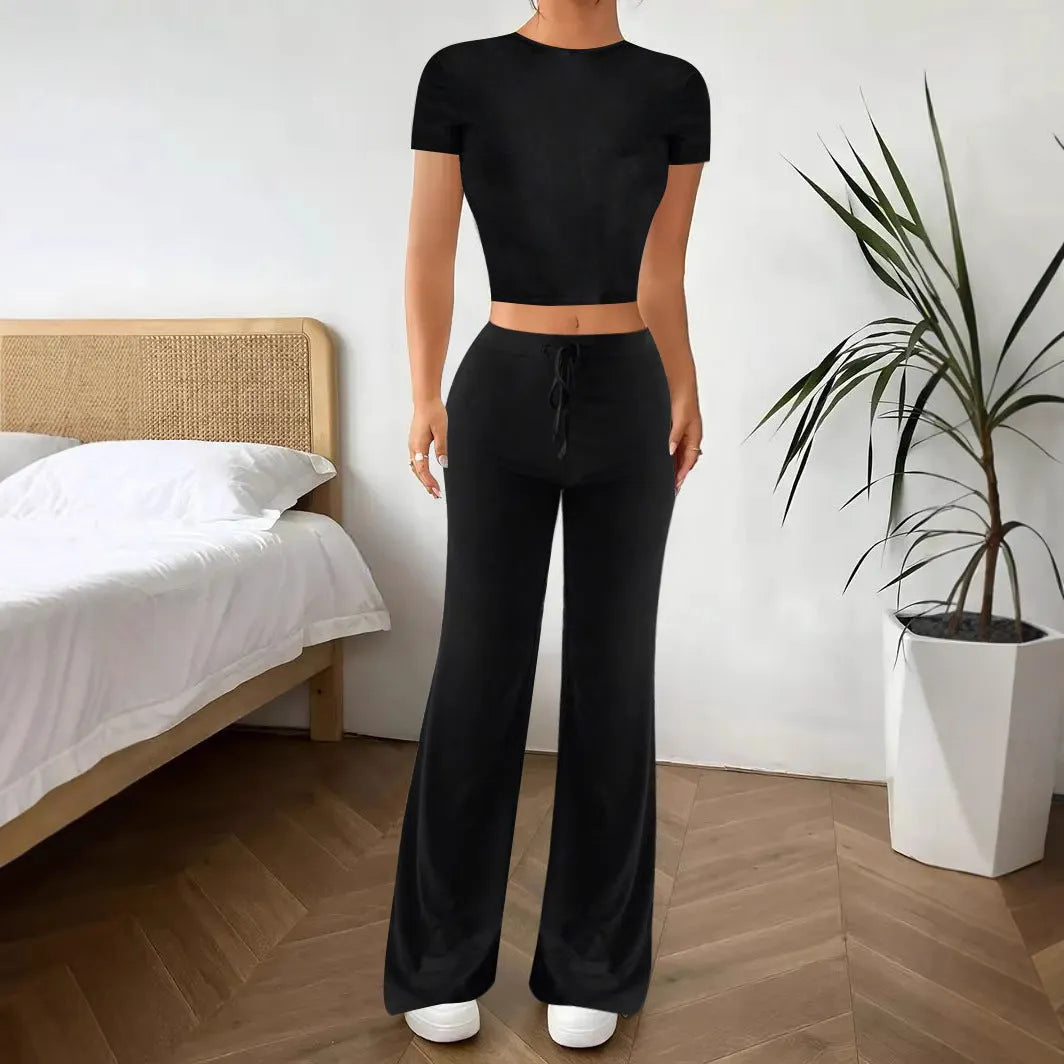 Black women's co-ord suit set with high-waist trousers and short-sleeve t-shirt