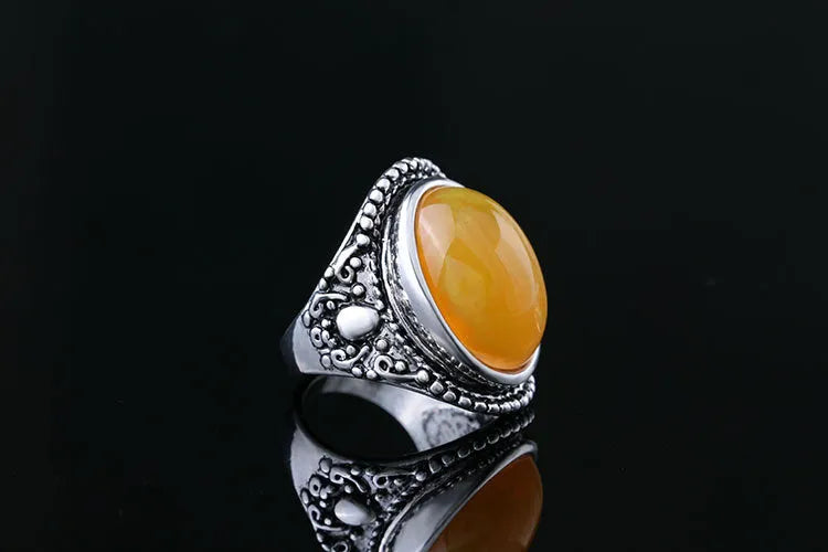 Fluorescent beeswax alloy electroplated ring in antique silver amber colour with a geometric retro design.