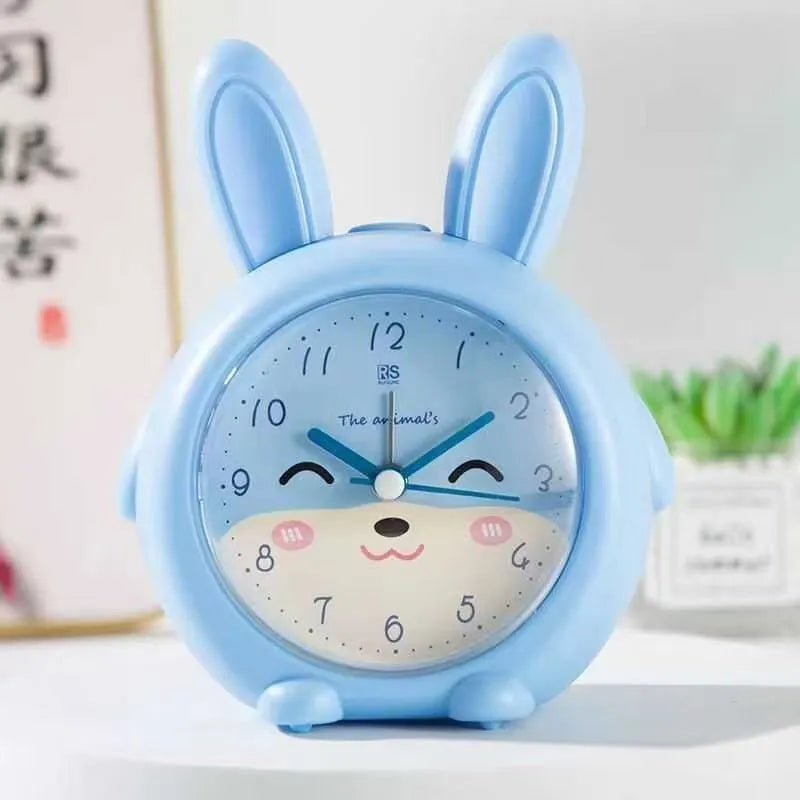 Children's cartoon alarm clock with night light in pink or blue colours, 6.5cm thickness
