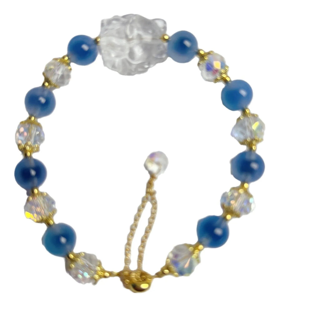 Handmade blue glazed agate nine tail fox bracelet on white background