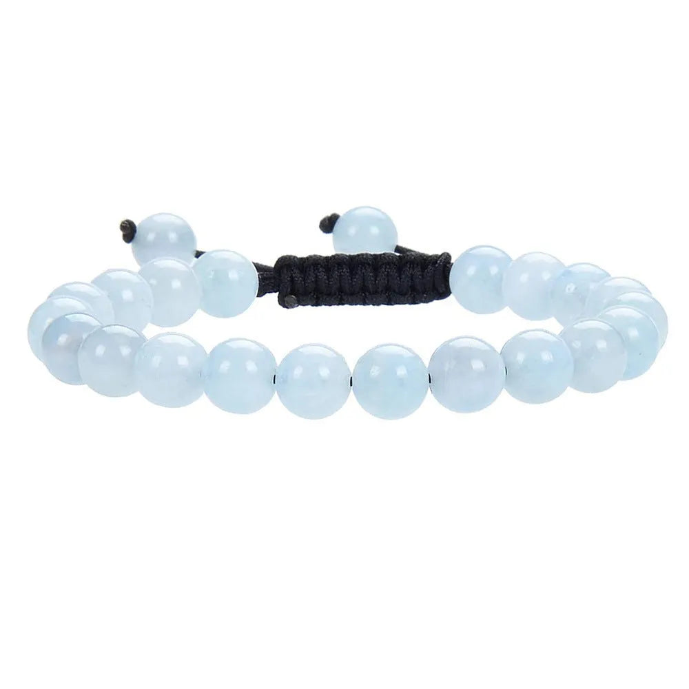 Women's aquamarine flat knot braided healing bracelet with hand-woven geometric texture