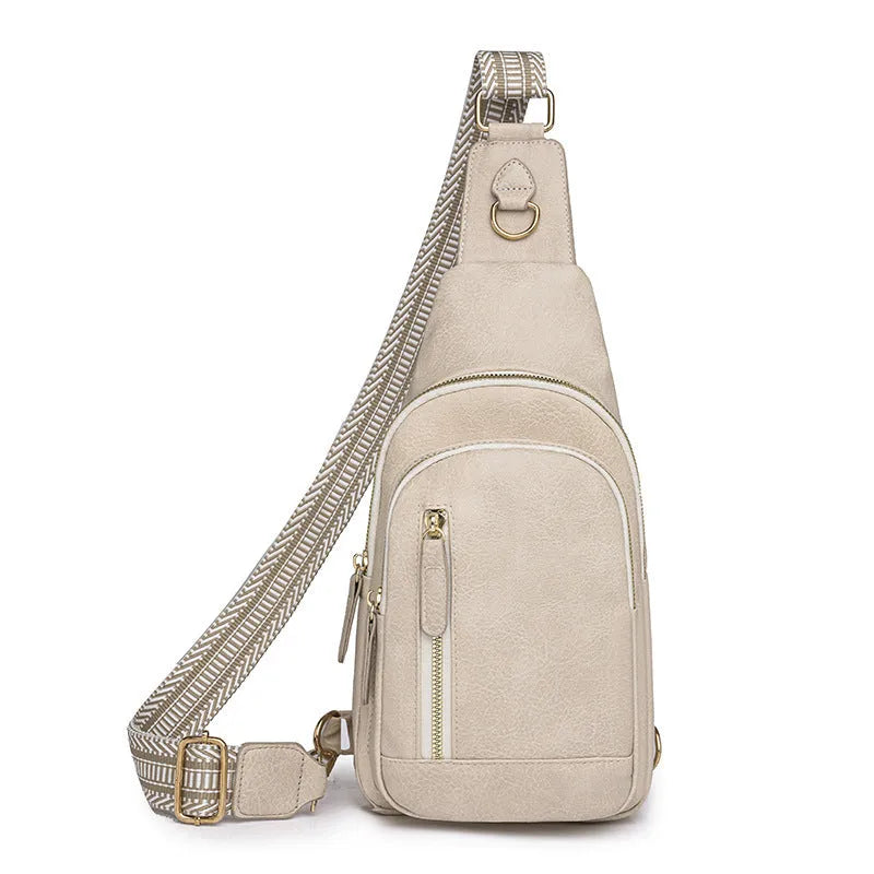 Soft brown PU leather women's crossbody chest bag with open pocket and stitching detail.