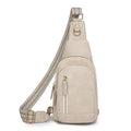 Soft brown PU leather women's crossbody chest bag with open pocket and stitching detail.