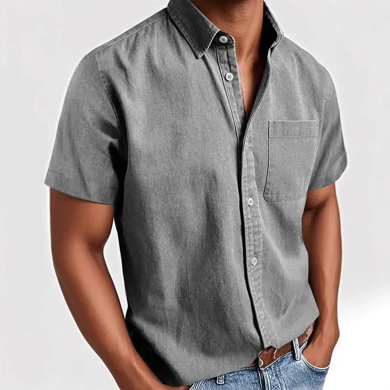 Men's solid colour short-sleeved shirt with a polo collar and a chest pocket.