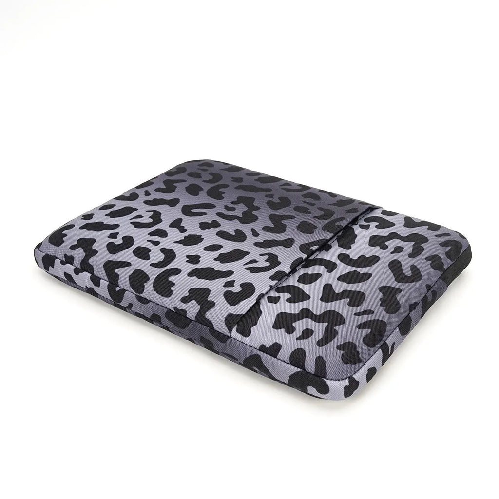 Leopard print laptop sleeve open to show flannel lining, suitable for 13-inch to 16-inch laptops