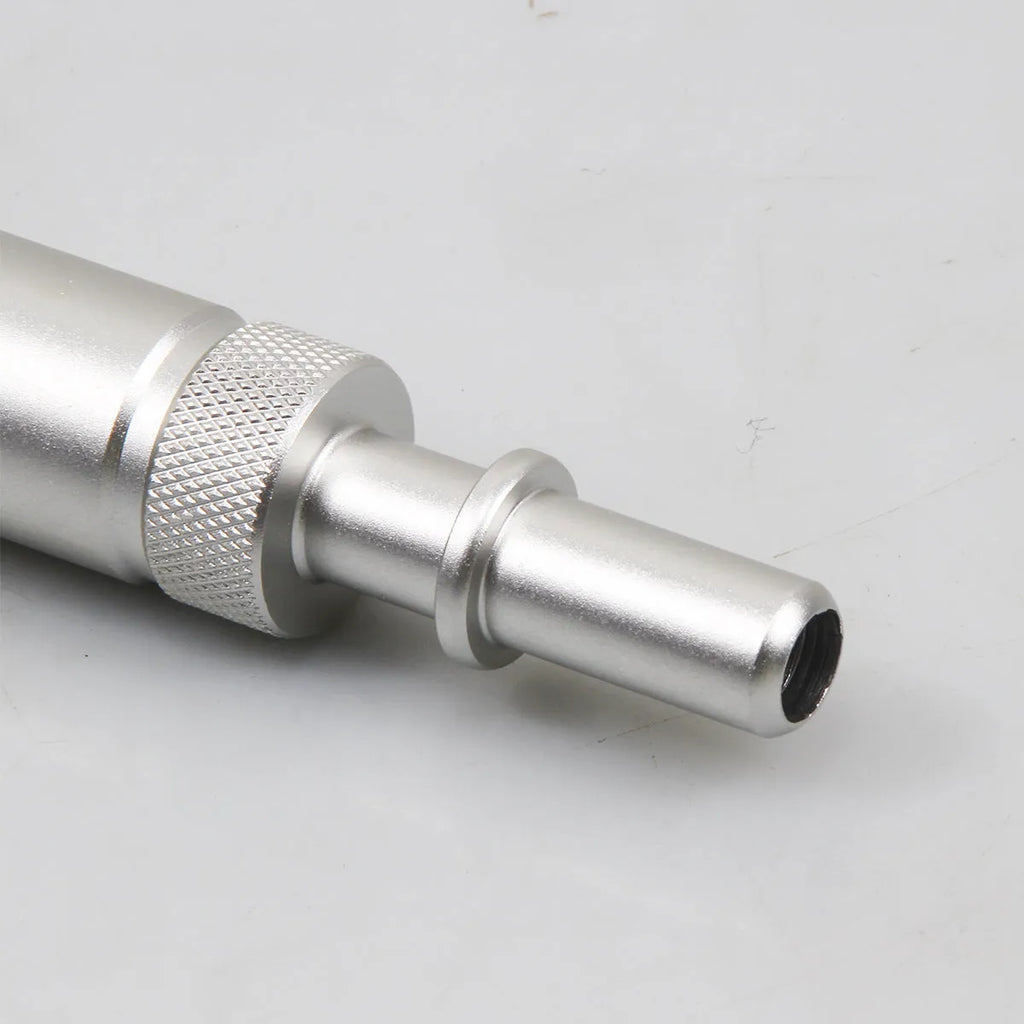 Silver metal transmission refueling joint adapter for VAS6262-9 procedure on white background.