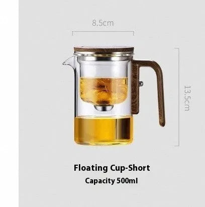 Chinese-style glass teapot with wooden handle showing magnetic filtration button and inner infuser container.