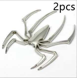 Zinc alloy 3D spider car bumper sticker in gold, silver, black, and red colours.